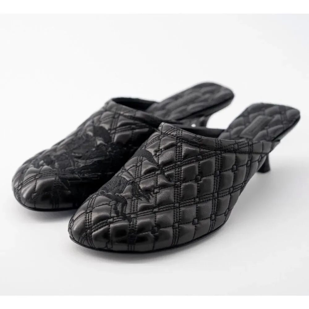 Burberry Leather Kitten Heel Baby Mules in black with an embroidered Equestrian